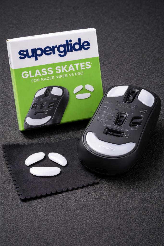 Make mouse glide faster with glass mouse feet installed on a gaming mouse, showing low-friction glide on a mousepad.